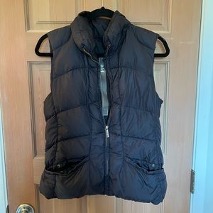 Add Down Vest. Used condition. Wonderful Vest, still some life there